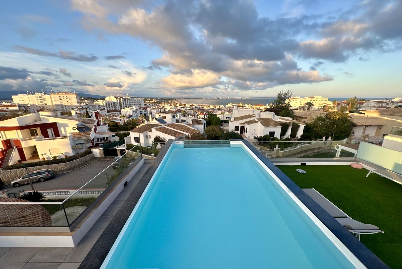 Heated rooftop pool at dusk
