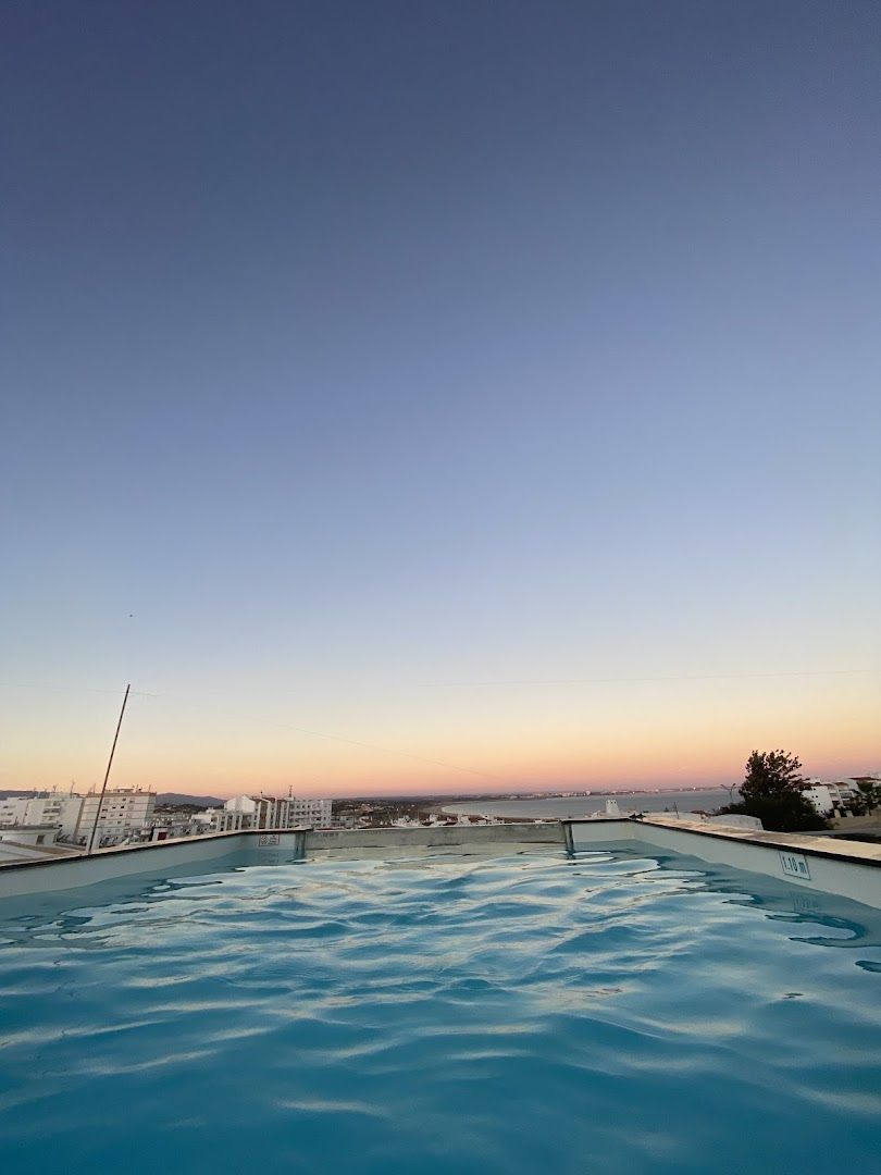 Rooftop pool at sunset